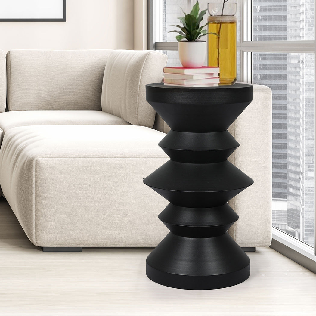 Black Side Table beside sofa 