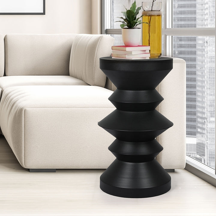 Black Side Table beside sofa 