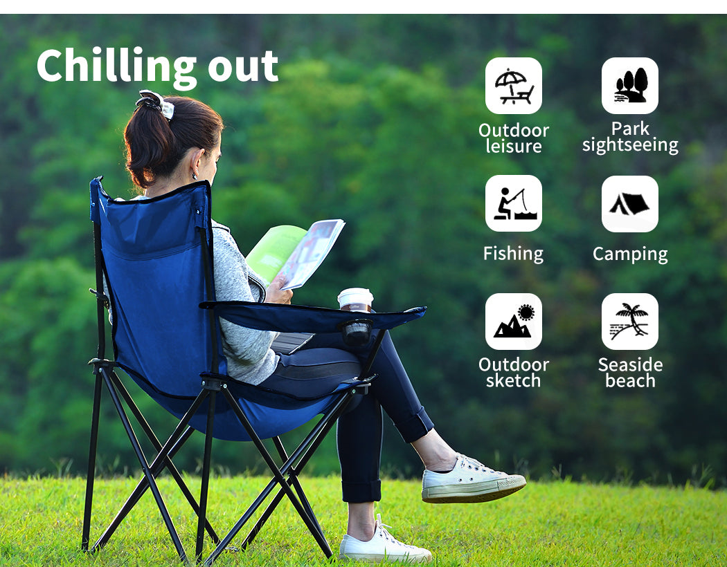 Lady relaxing on Levede Camping Chair blue