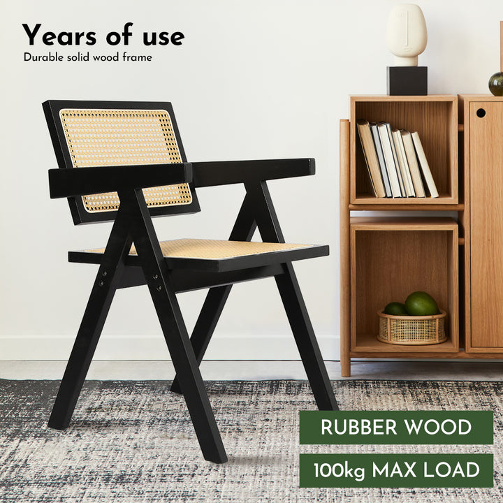 Levede Black Wicker Armchair beside bookshelf 
