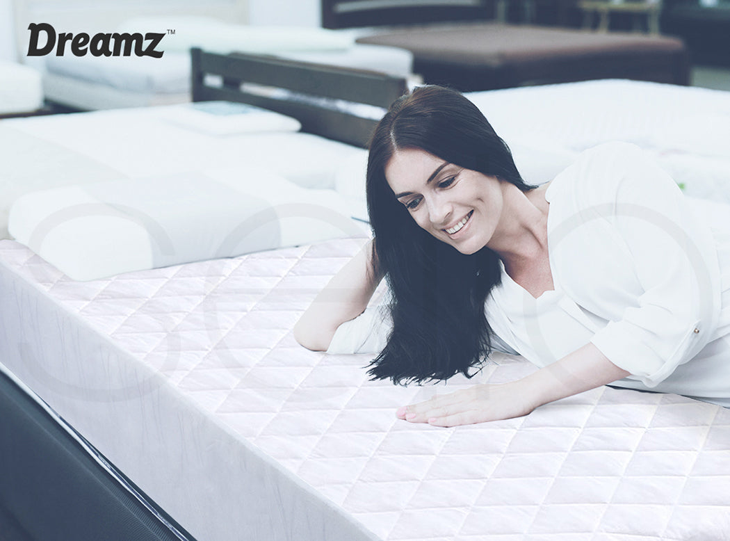 lady on the  DreamZ Fully Fitted Waterproof Microfiber Mattress Protector 