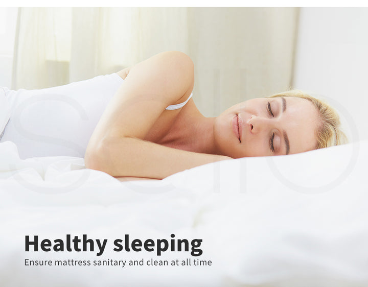 lady resting on Dreamz Cotton Mattress Protector Fitted Sheet 